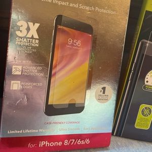 Invisible shield glass plus screen protector, multiple pop sockets and cases